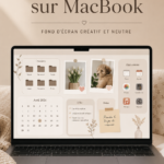 Bureau organisé avec un MacBook et un fond d'écran créatif